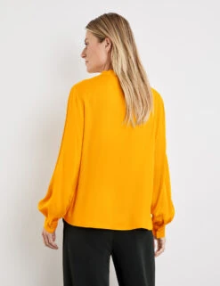 Gerry Weber Fließende Bluse Mit Leichten Ballonärmeln -Gerry Stil Geschaft fliessende bluse mit leichten ballonaermeln 104